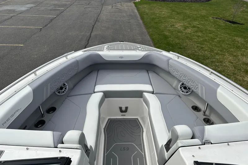 Slide: The Image of 2026 Regal LS9 boat interior with sleek seating and modern design. - 15