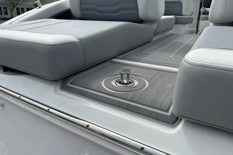 Slide: The Image of 2026 Regal LS9 boat interior with sleek gray seating and modern deck design. - 21