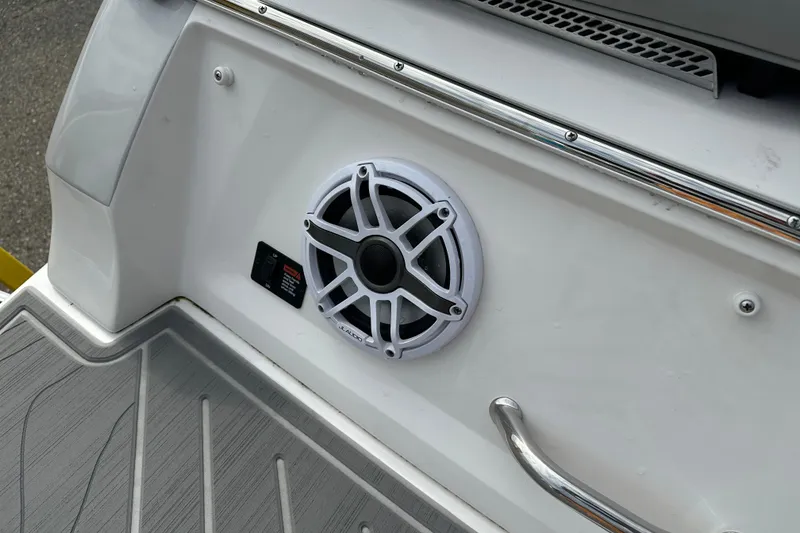 Slide: The Image of 2026 Regal LS9 boat speaker and handle on deck, showcasing modern design. - 24