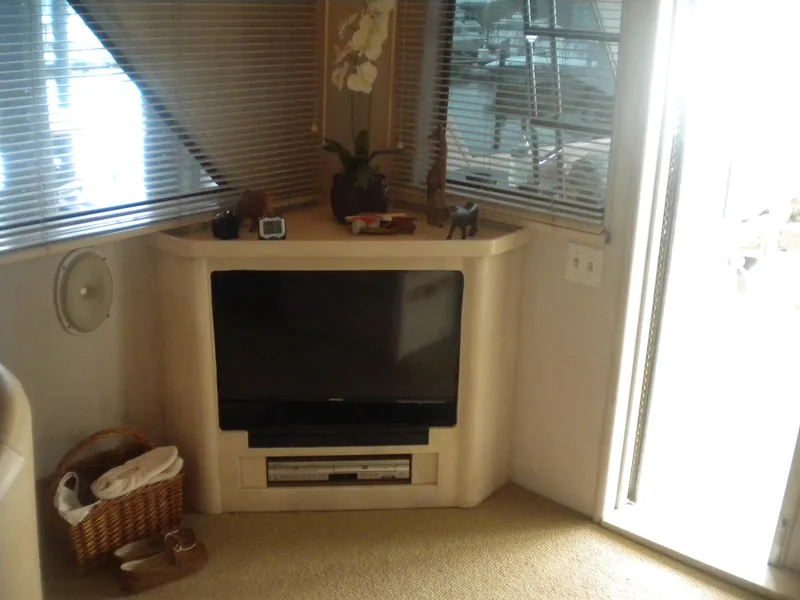 Slide: The Image of Interior of 1987 Hatteras 53 Motor Yacht with TV and decor. - 13