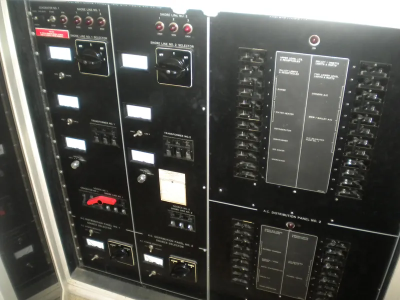 Slide: The Image of Electrical control panel on a 1987 Hatteras 53 Motor Yacht. - 17
