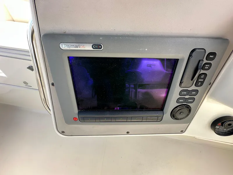 Slide: The Image of Control panel of a 1996 Carver Voyager boat with Raymarine display. - 24