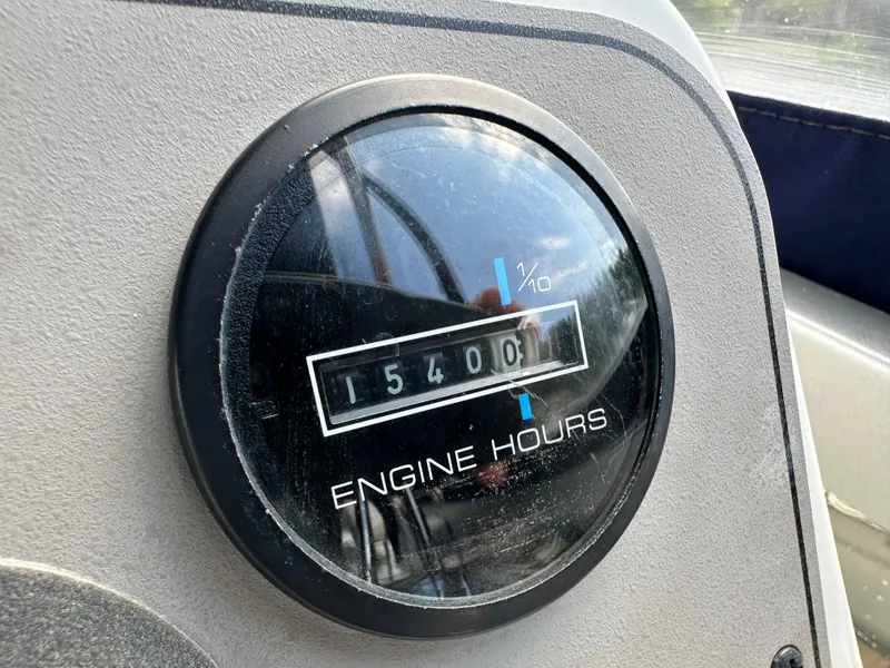 Slide: The Image of Close-up of 1996 Carver Voyager engine hours gauge showing 1540.0 hours. - 49