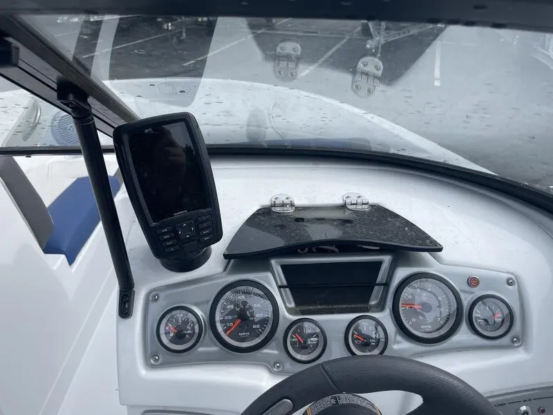 Slide: The Image of Dashboard of a 2019 Tahoe 500 TS boat with gauges and navigation system. - 1