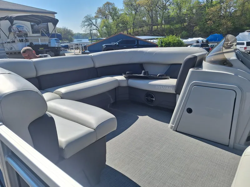 Slide: The Image of 2024 Sylvan Mirage Cruise 8520 CLZ DH pontoon boat with spacious seating and modern design. - 13