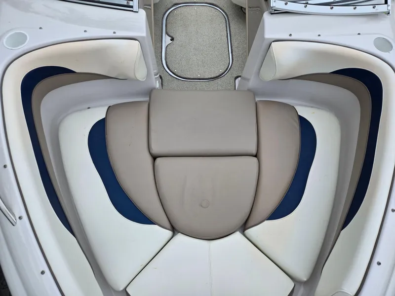 Slide: The Image of 1998 Four Winns Horizon RS RX boat interior with cushioned seating. - 18