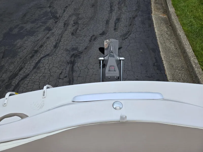 Slide: The Image of 1998 Four Winns Horizon RS RX boat trailer hitch on cracked asphalt road. - 25