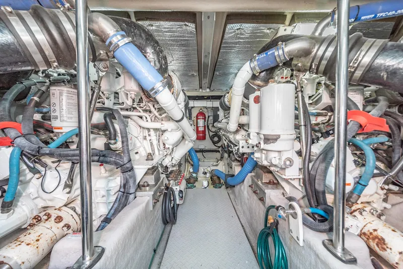 Slide: The Image of Engine room of 2008 Sea Ray 58 Sedan Bridge, showcasing mechanical components and systems. - 42
