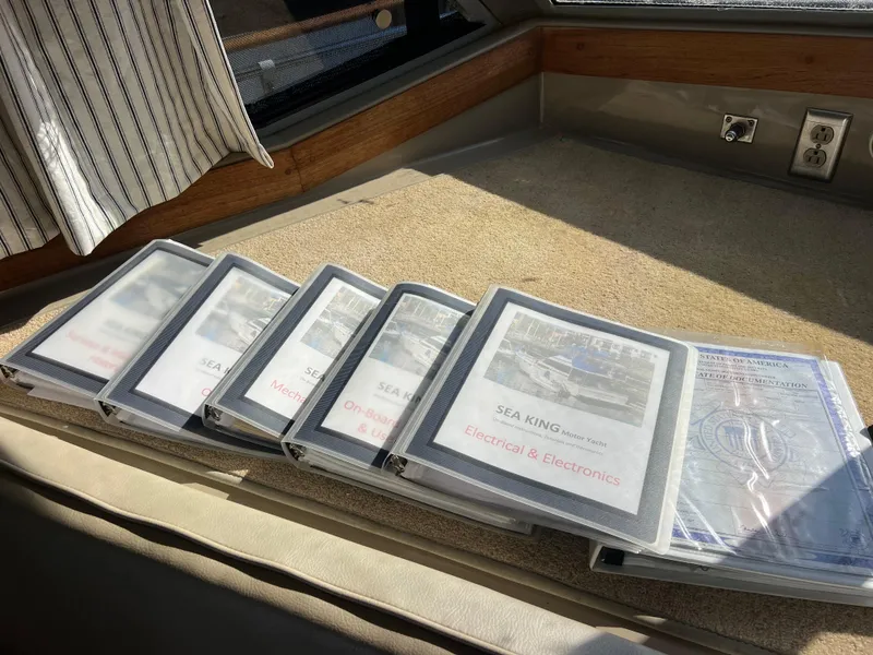 Slide: The Image of 1986 Bayliner 3870 Motoryacht interior kitchen with sink, counter, and storage cabinets. - 27