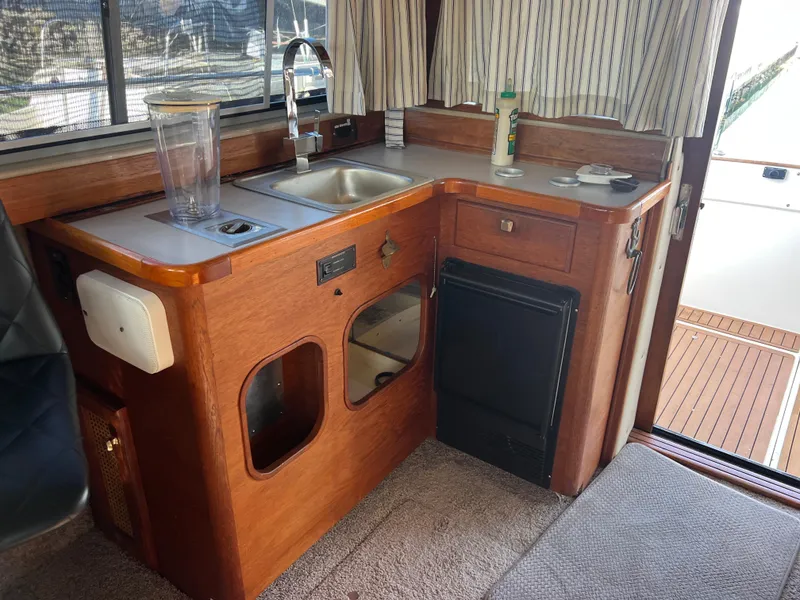 Slide: The Image of Electrical panel with blue cables on a 1986 Bayliner 3870 Motoryacht. - 30