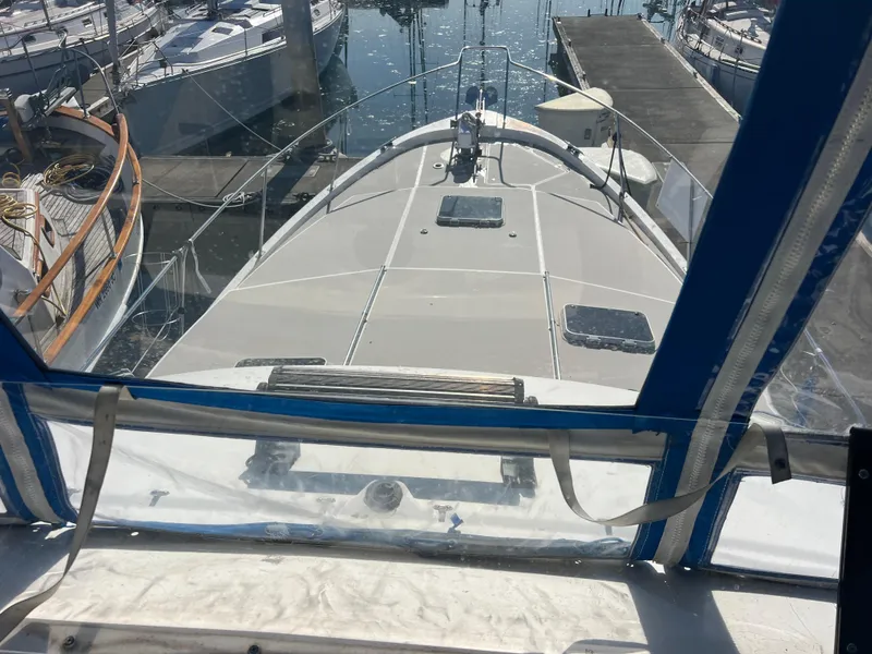 Slide: The Image of 1986 Bayliner 3870 Motoryacht cockpit with blue trim and navigation equipment. - 40