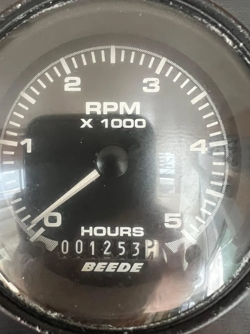 Slide: The Image of Tachometer of 2004 Albin 35 Tournament Express showing 1253 hours. - 16