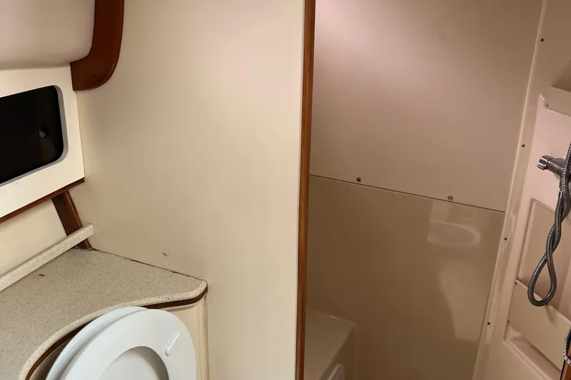 Slide: The Image of 2004 Albin 35 Tournament Express bathroom interior with shower and toilet. - 22