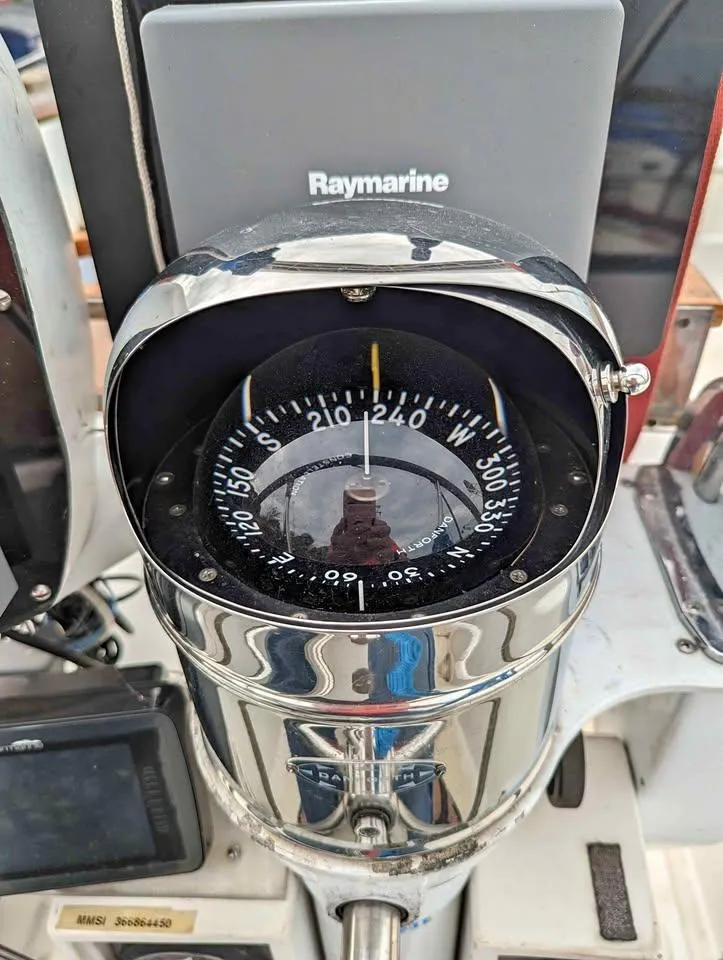 Slide: The Image of Compass and navigation equipment on 1985 Endeavour 42 CC sailboat. - 9