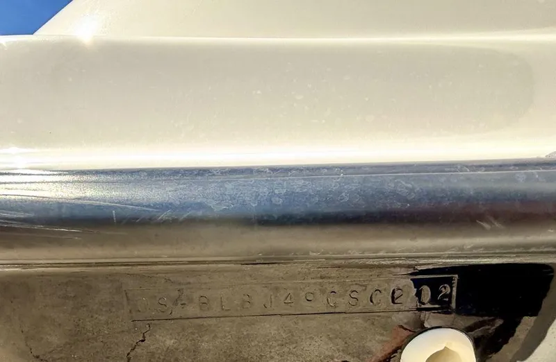 Slide: The Image of Close-up of a 2012 Bayliner 185 Bowrider hull identification number. - 9