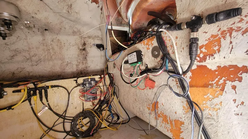 Slide: The Image of Interior wiring of a 2003 Hurricane 237 Fun Deck boat with Yamaha 200 Four Stroke engine. - 23