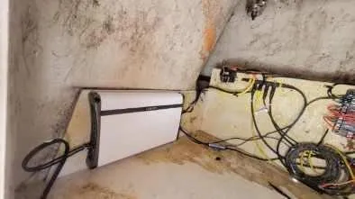 Slide: The Image of Electrical wiring and components inside a 2003 Hurricane 237 Fun Deck boat. - 24