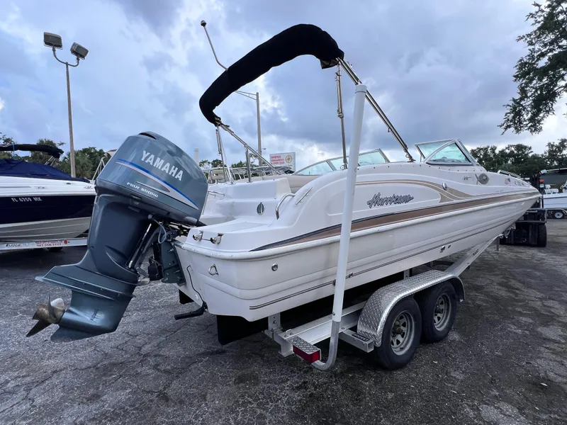 Slide: The Image of 2003 Hurricane 237 Fun Deck boat with Yamaha 200 Four Stroke engine on trailer. - 3