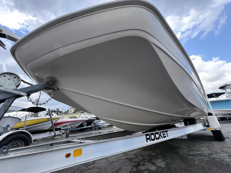 Slide: The Image of 2003 Hurricane 237 Fun Deck boat on trailer, featuring Yamaha 200 Four Stroke engine. - 8