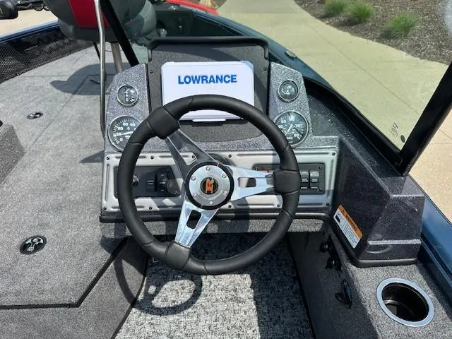 Slide: The Image of 2025 Ranger VS1782SC Reata boat dashboard with Lowrance display and steering wheel. - 6