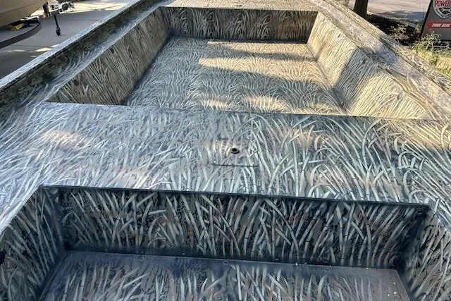 Slide: The Image of 2025 Tracker GRIZZLY 1860 Utility boat with camouflage interior design. - 3