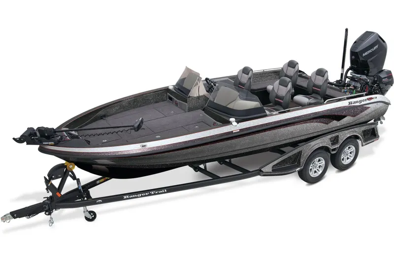 The Image of 2025 Ranger 621FS Pro boat on trailer, parked outdoors with scenic background. - 0
