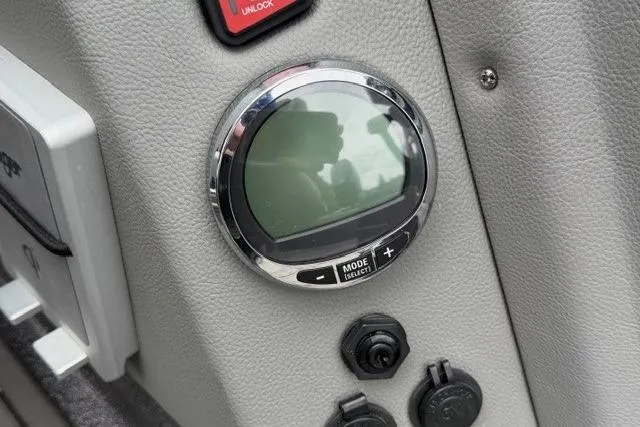 Slide: The Image of Dashboard of 2025 Ranger 621FS Pro boat with control panel and display. - 95