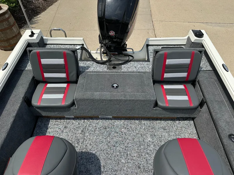 Slide: The Image of 2025 Ranger VS1682SC Reata boat interior with gray and red seating. - 10