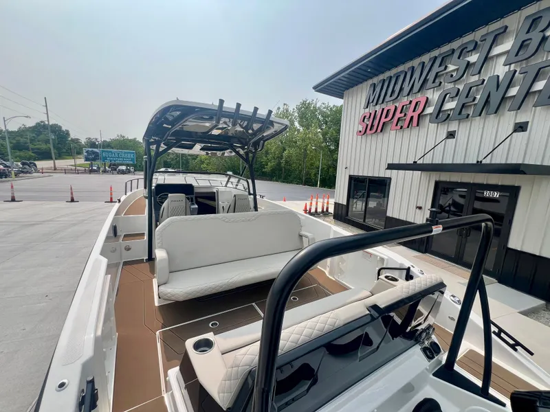 Slide: The Image of 2025 Navan S-30 boat at Midwest Boat Super Center, featuring spacious seating and modern design. - 24