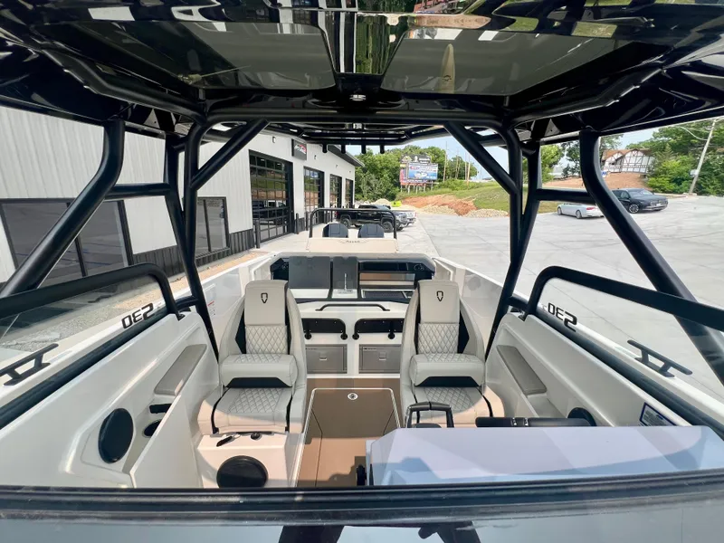 Slide: The Image of Interior view of 2025 Navan S-30 boat, featuring modern seating and sleek design. - 27