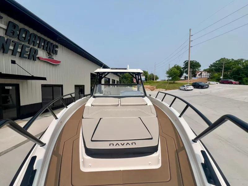 Slide: The Image of 2025 Navan S-30 boat at a boating center, showcasing sleek design and modern features. - 41