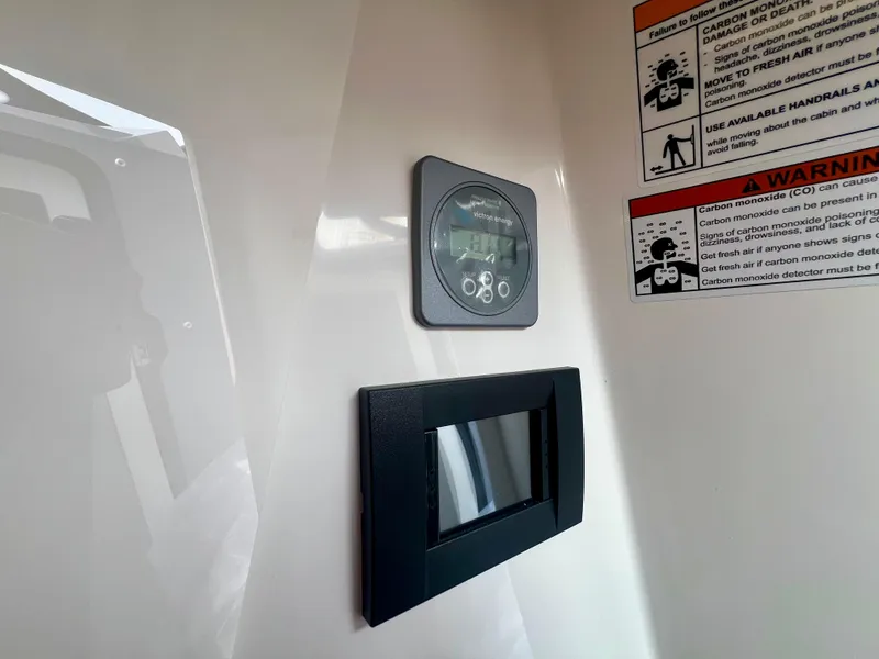 Slide: The Image of Interior of Navan S-30 (2025) with control panel and safety warnings. - 45