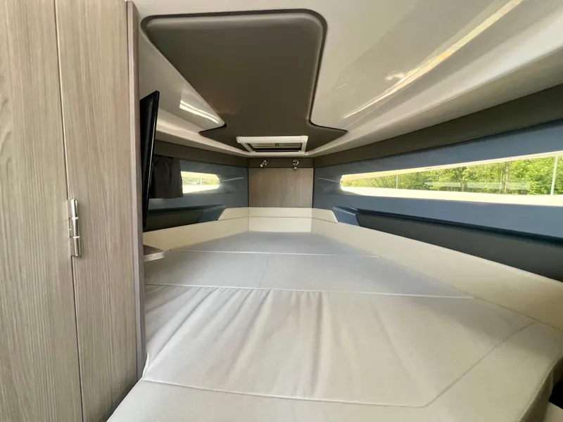 Slide: The Image of Interior of 2025 Navan S-30 boat cabin with modern design and large windows. - 48