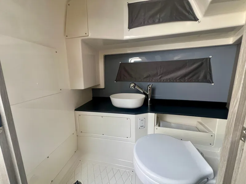 Slide: The Image of Modern bathroom in 2025 Navan S-30 boat with sleek fixtures and compact design. - 49
