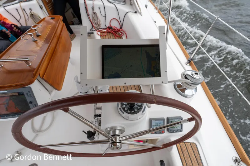 Slide: The Image of Steering wheel and navigation equipment on a 2008 Beneteau Oceanis 43 sailboat. - 32