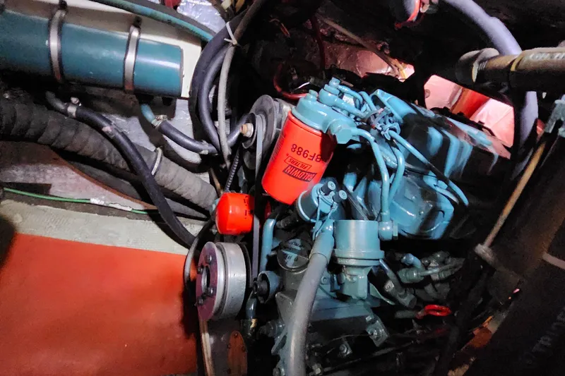 Slide: The Image of Engine compartment of a 1989 Valiant 40 Cutter sailboat, showcasing mechanical components. - 45