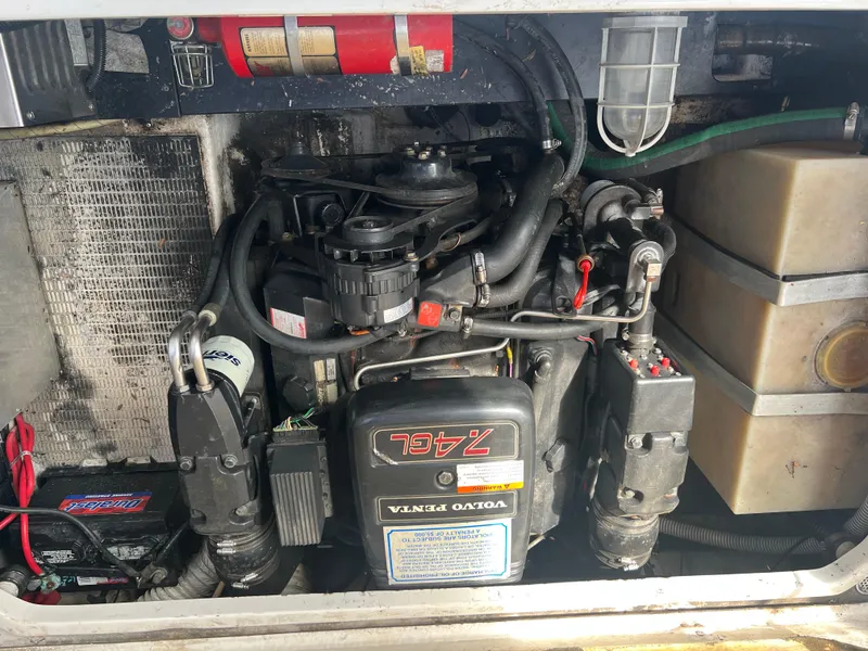 Slide: The Image of Engine compartment of a 1997 Chris-Craft 26 Crowne Cruiser with Volvo Penta engine. - 15