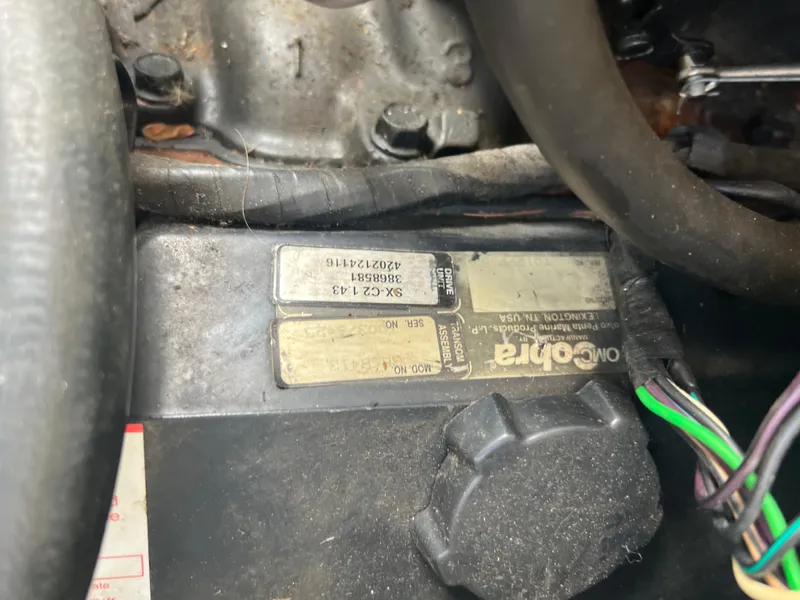 Slide: The Image of Engine compartment of a 1997 Chris-Craft 26 Crowne Cruiser with visible labels and wiring. - 17
