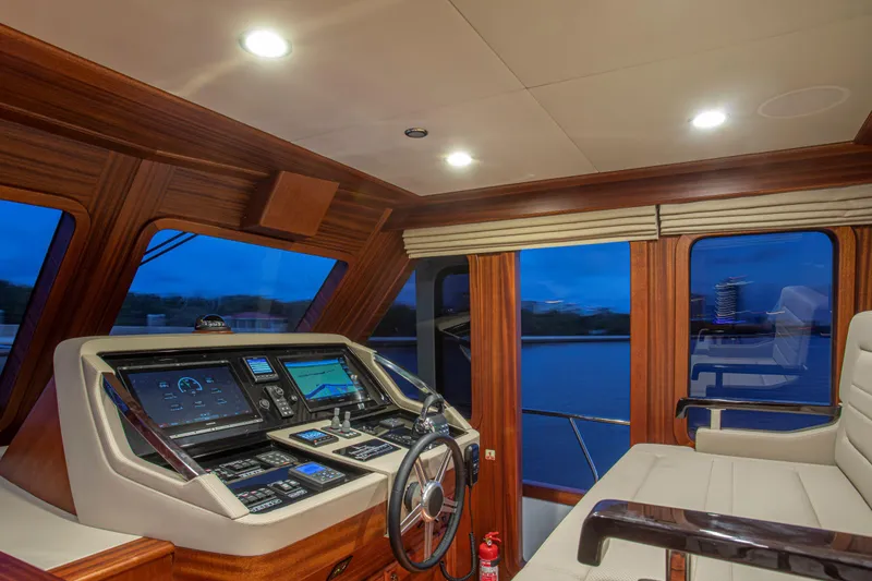 Slide: The Image of Vicem 67 Cruiser 2020 yacht interior with modern navigation controls and luxurious seating. - 12