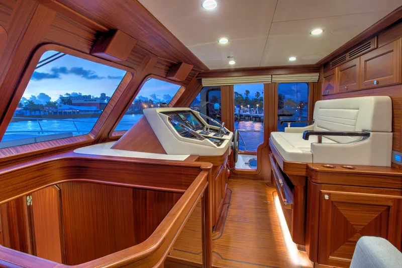 Slide: The Image of Luxurious interior of 2020 Vicem 67 Cruiser yacht with elegant wood finish. - 13