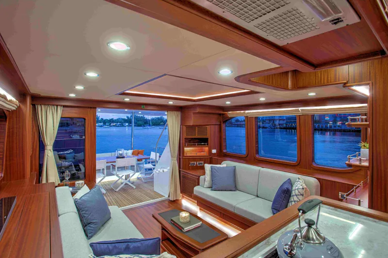 Slide: The Image of Luxurious interior of 2020 Vicem 67 Cruiser yacht with elegant seating and waterfront view. - 15