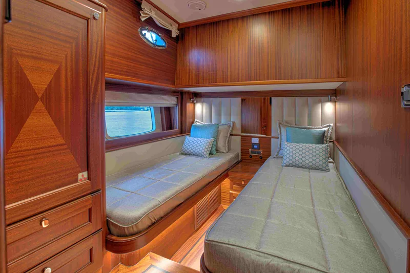 Slide: The Image of Luxurious twin cabin in 2020 Vicem 67 Cruiser yacht with elegant wood finish. - 27