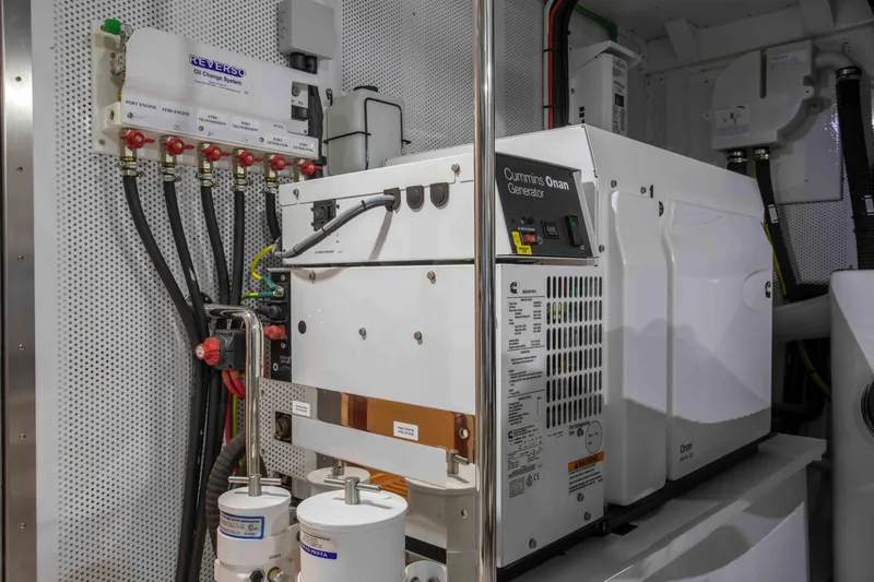 Slide: The Image of Engine room of 2020 Vicem 67 Cruiser with Cummins Onan generator and fuel system. - 30