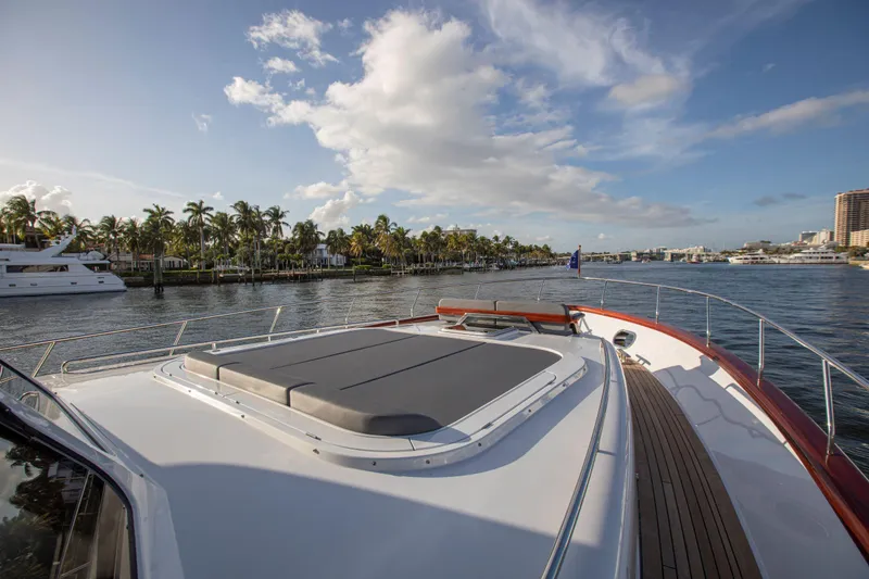 Slide: The Image of Vicem 67 Cruiser 2020 yacht on a scenic waterway with palm trees and blue sky. - 5