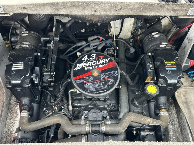 Slide: The Image of Engine of a 2005 Sea Ray 185 Sport with 4.3L Mercury MerCruiser. - 9