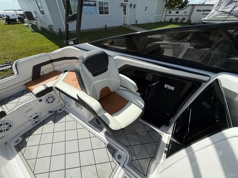 Slide: The Image of 2016 Yamaha Boats AR240 interior with seating and modern design features. - 15