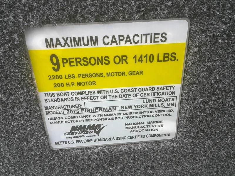 Slide: The Image of 2025 Lund 2075 Fisherman boat capacity label: 9 persons or 1410 lbs, 200 HP motor. - 10