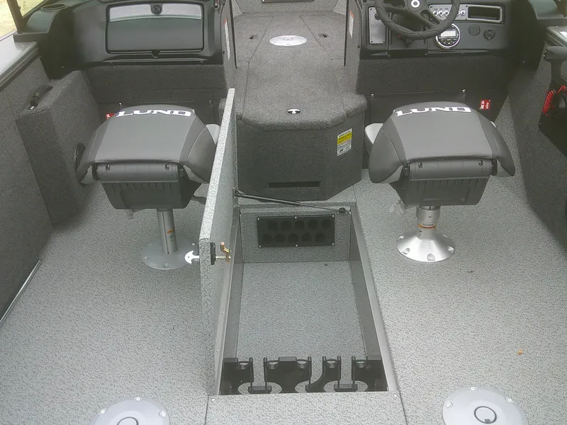 Slide: The Image of Interior of 2025 Lund 2075 Fisherman boat with two seats and storage compartments. - 14