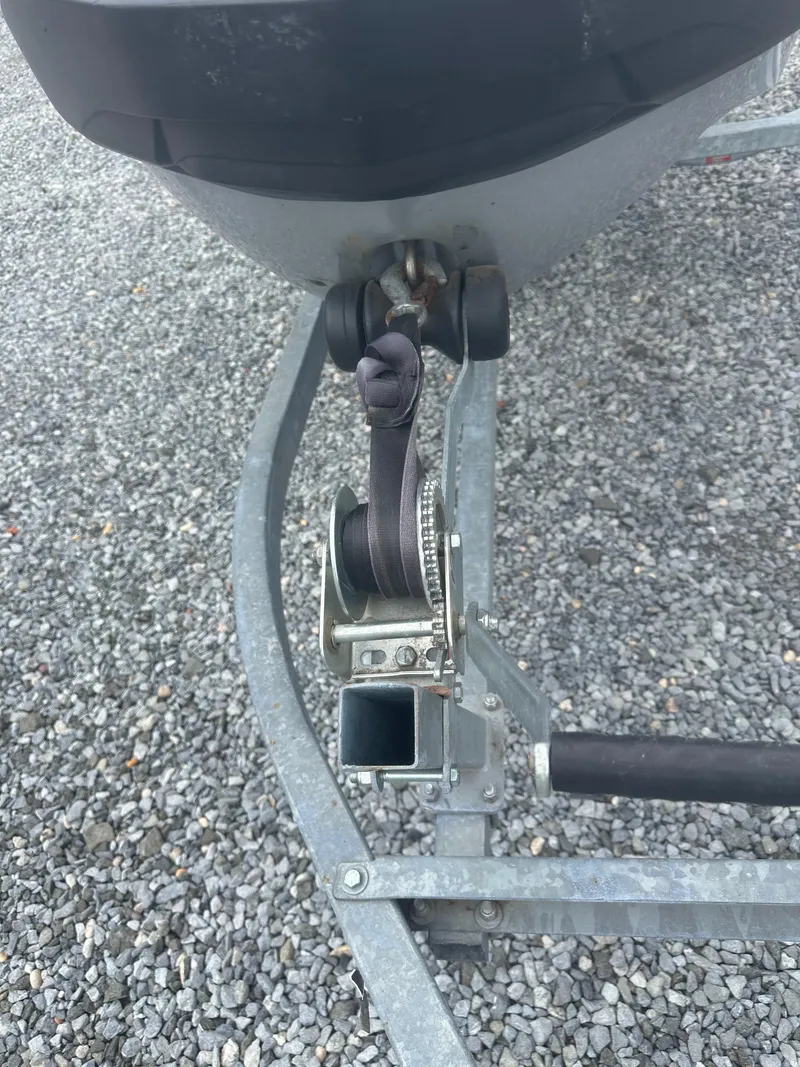 Slide: The Image of 2020 Sea-Doo GTX Limited 300 on trailer with winch, parked on gravel. - 12