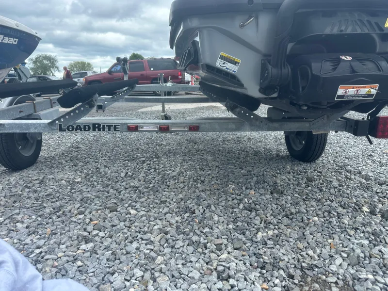 Slide: The Image of 2020 Sea-Doo GTX Limited 300 on Load Rite trailer, parked on gravel. - 17